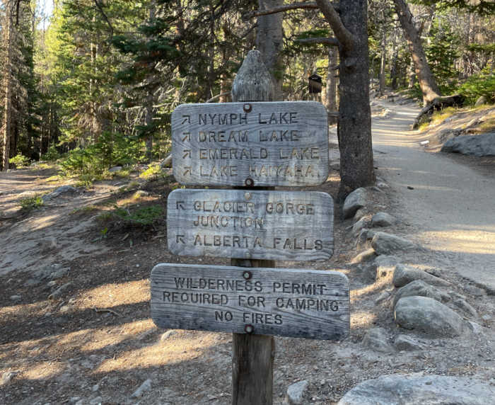 trail sign at Rocky Mountain National Park for Nymph Lake, Dream Lake, Emerald Lake, Lake Haiyaha