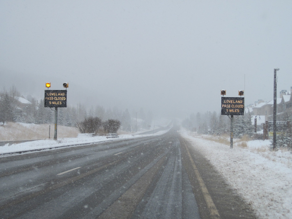 Loveland Pass electronic road signs in snowstorm