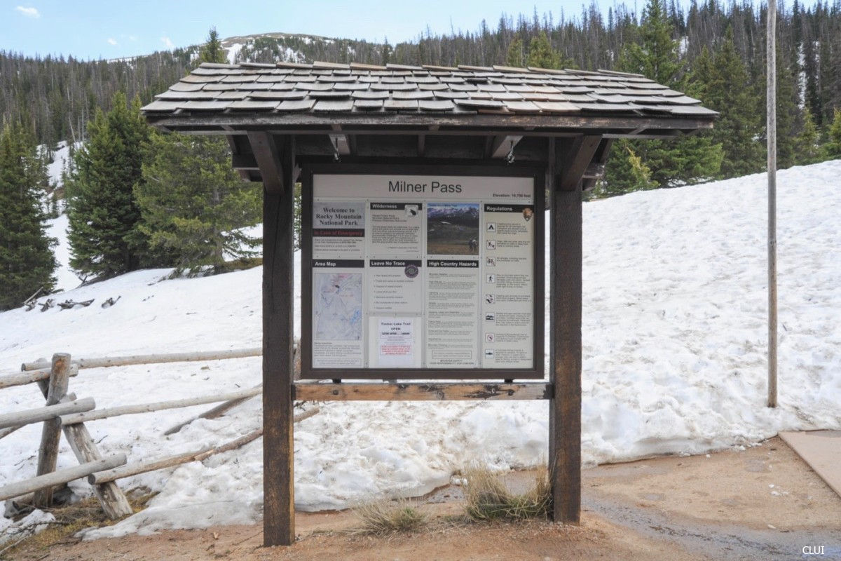 sign at top of Milner Pass Colorado on Continental Divide