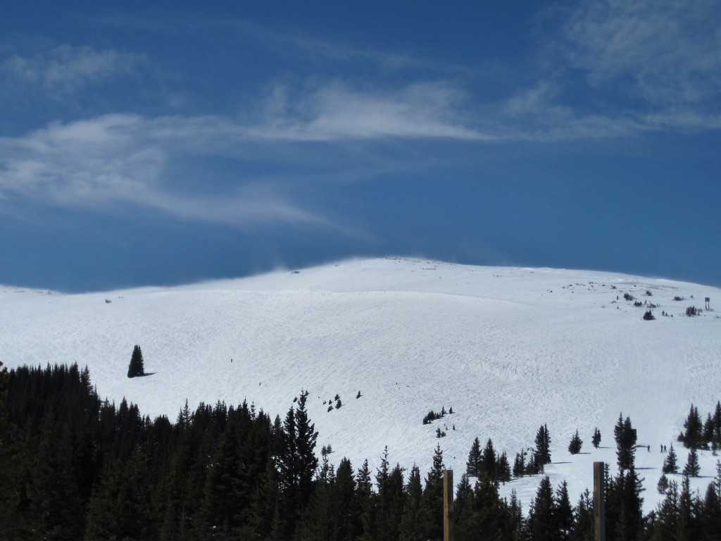 Parsenn Bowl windy conditions on blue sky day