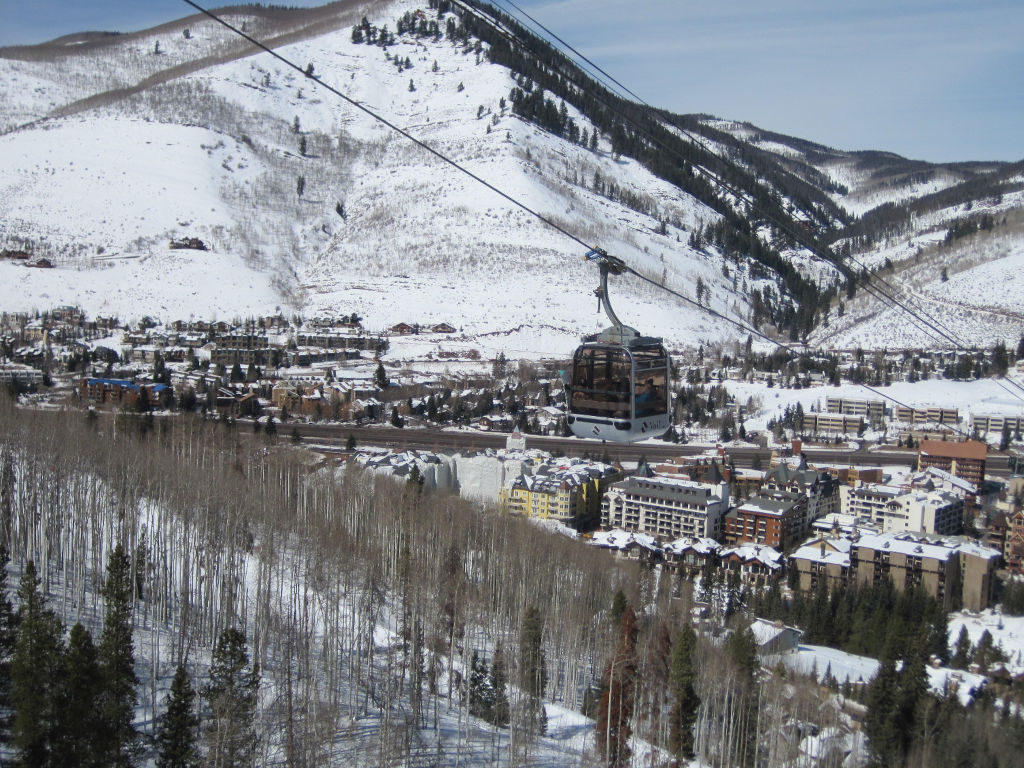 Vail Eagle Bahn Gondola ascending above Lionshead Village in Vail