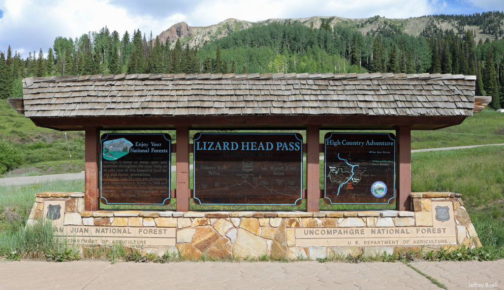 modern Lizard Head Pass sign at top of the pass