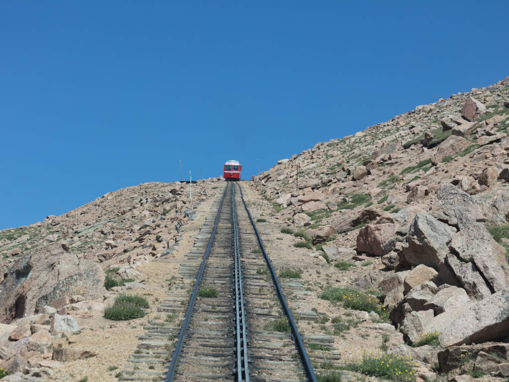 view following train up cog railway on Pikes Peak