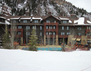 The Ritz-Carlton at Aspen Highlands in winter with pool slopeside