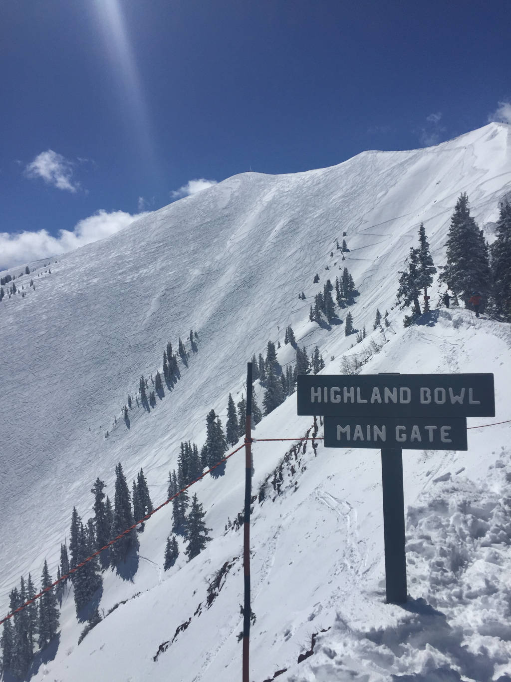 Highland Bowl gate for skier access into the bowl at Aspen Highlands