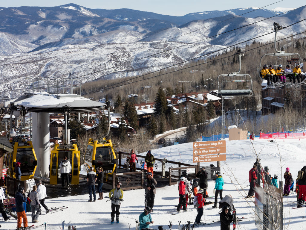 top unloading station of the free Sky Cab gondola with Village Express chairlift at Snowmass Ski Resort