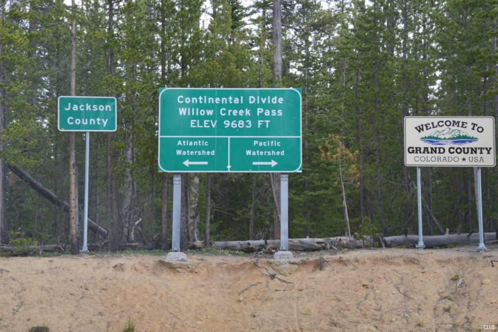 Continental Divide sign located on Willow Creek Pass