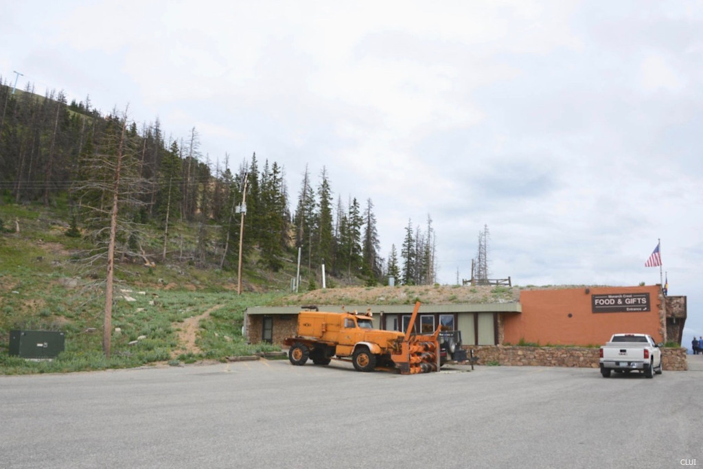 old Snogo snowplow sitting outside on Monarch Pass in Colorado