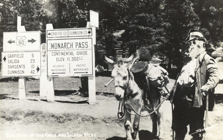 Monarch Pass Continental Divide signs with the Hermit of Arbor Villa