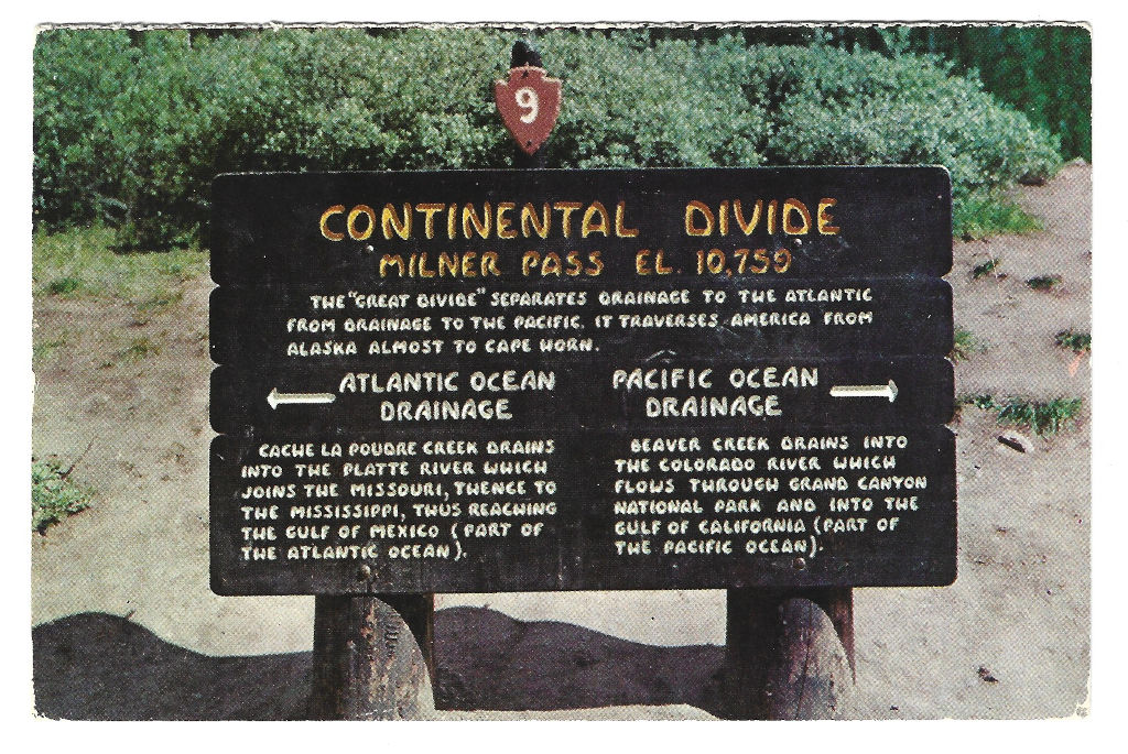 full scan of postcard CML-264 Milner Pass Continental Divide sign