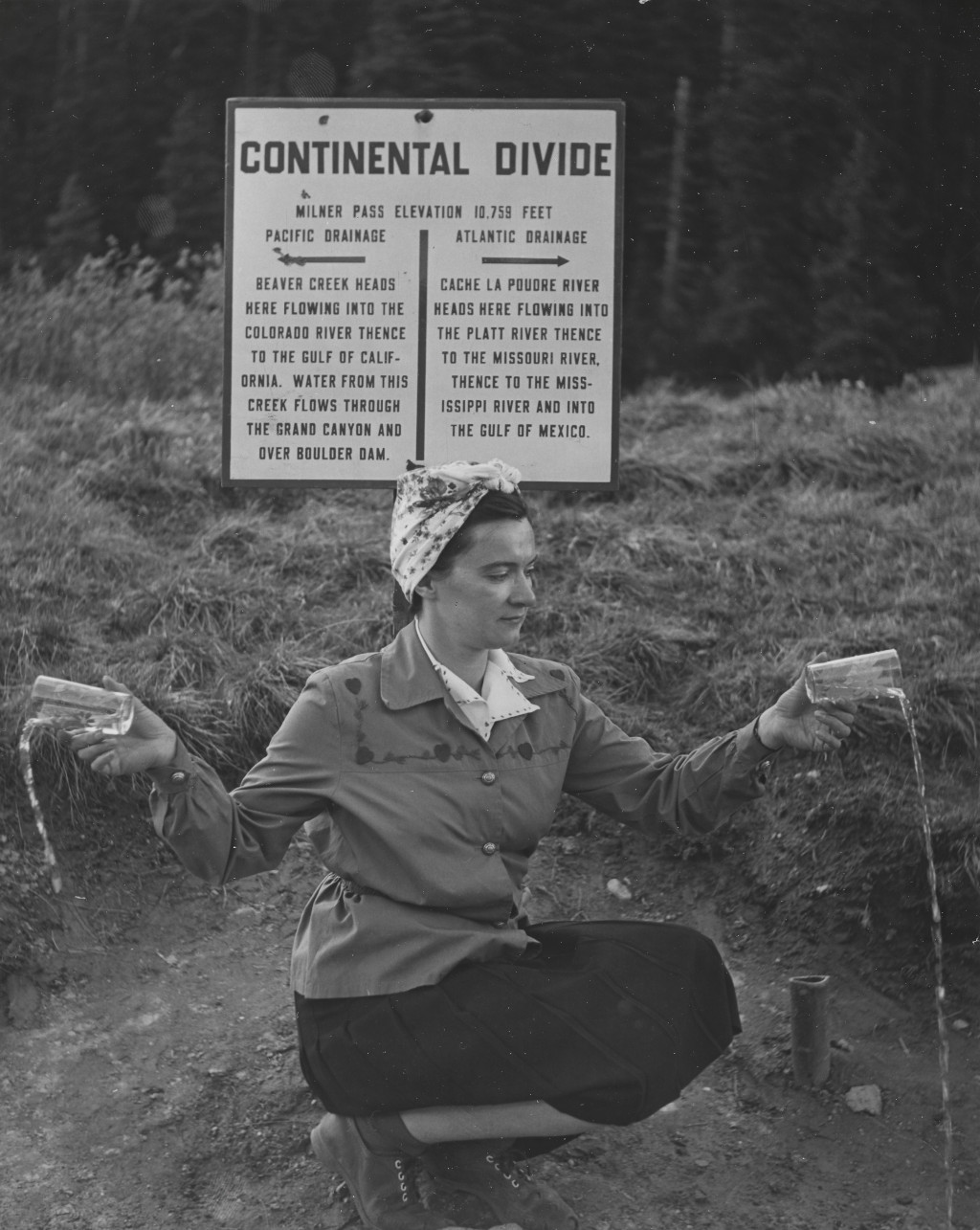 Milner Pass historical Continental Divide sign in year 1947