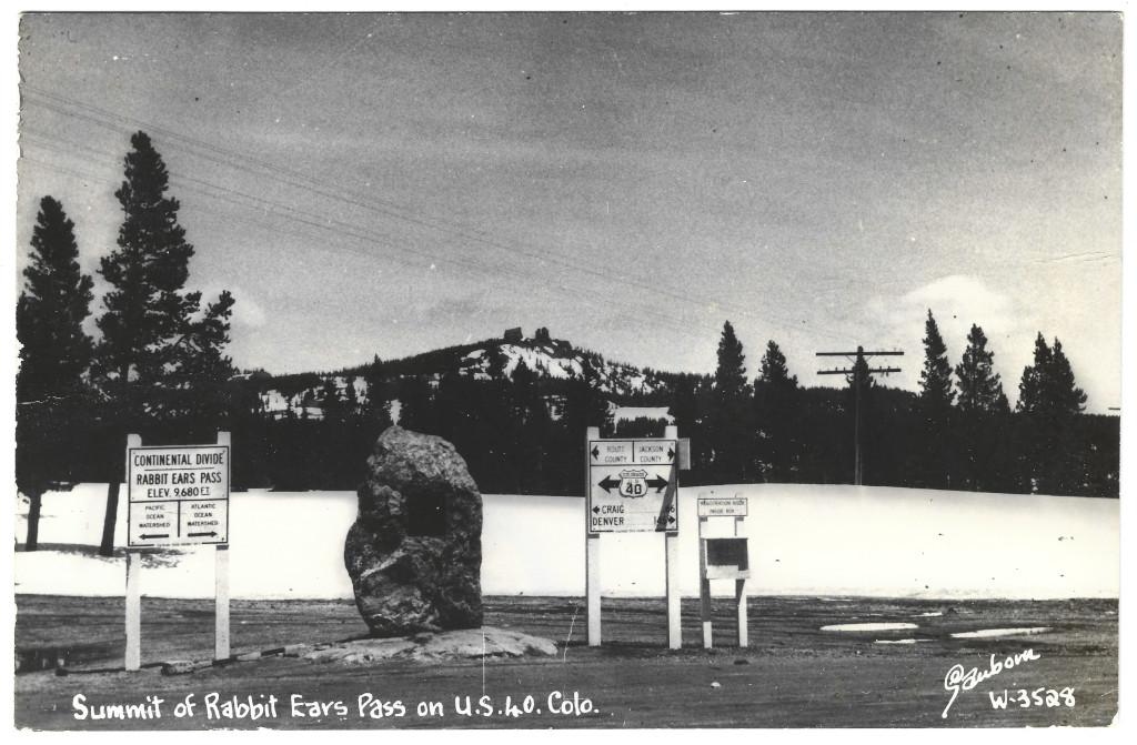 full scan of postcard CRA-W-3528 Rabbit Ears Pass Continental Divide sign