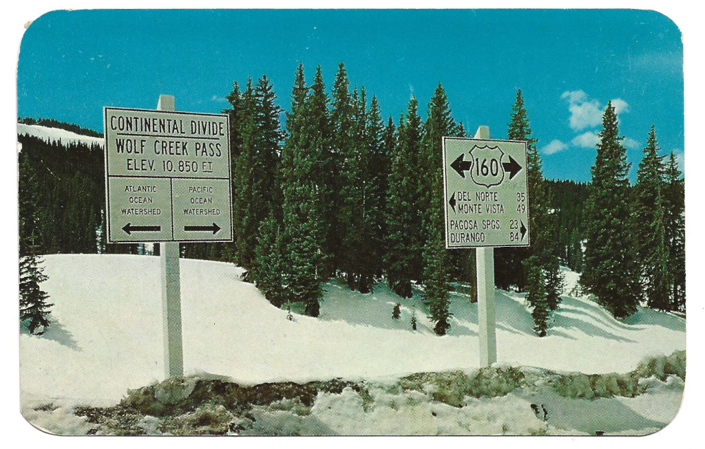 Full Scan of Wolf Creek Pass Continental Divide Sign postcard CWO-3744