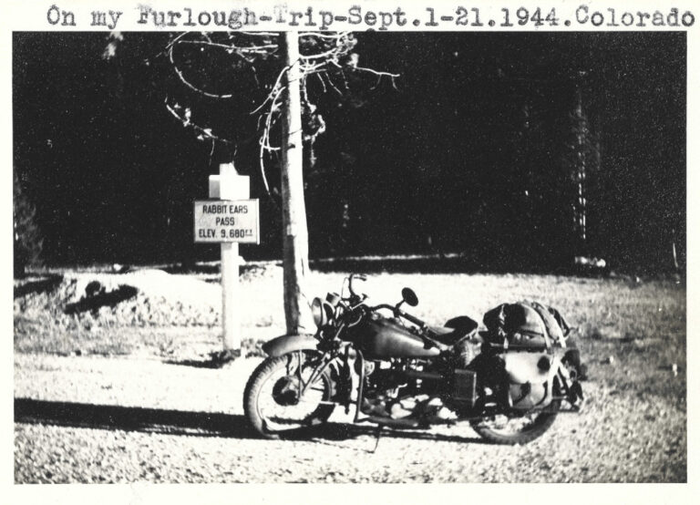 1944 Rabbit Ears Pass Continental Divide sign photograph with motorcycle by soldier on furlough