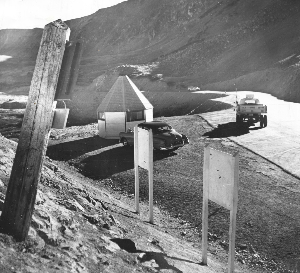 Loveland Pass Continental Divide signs and high altitude research center in October 1952 cropped version