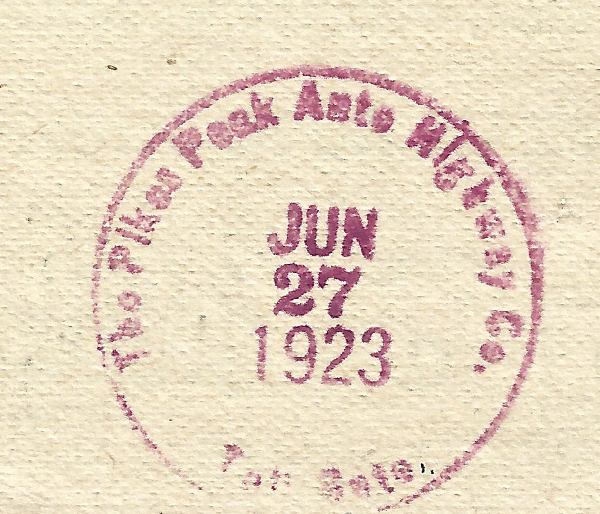 enlarged stamp from back of 1923 Pikes Peak Auto Highway souvenir toll road ticket ID PIK-6582