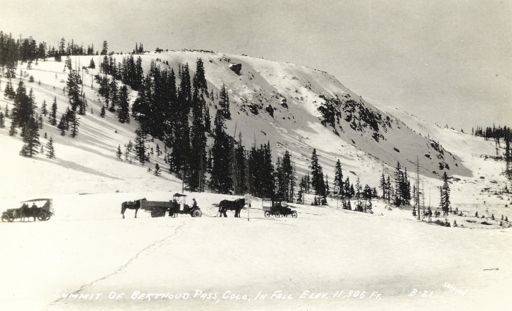 horses pulling car over top of Berthoud Pass circa 1926