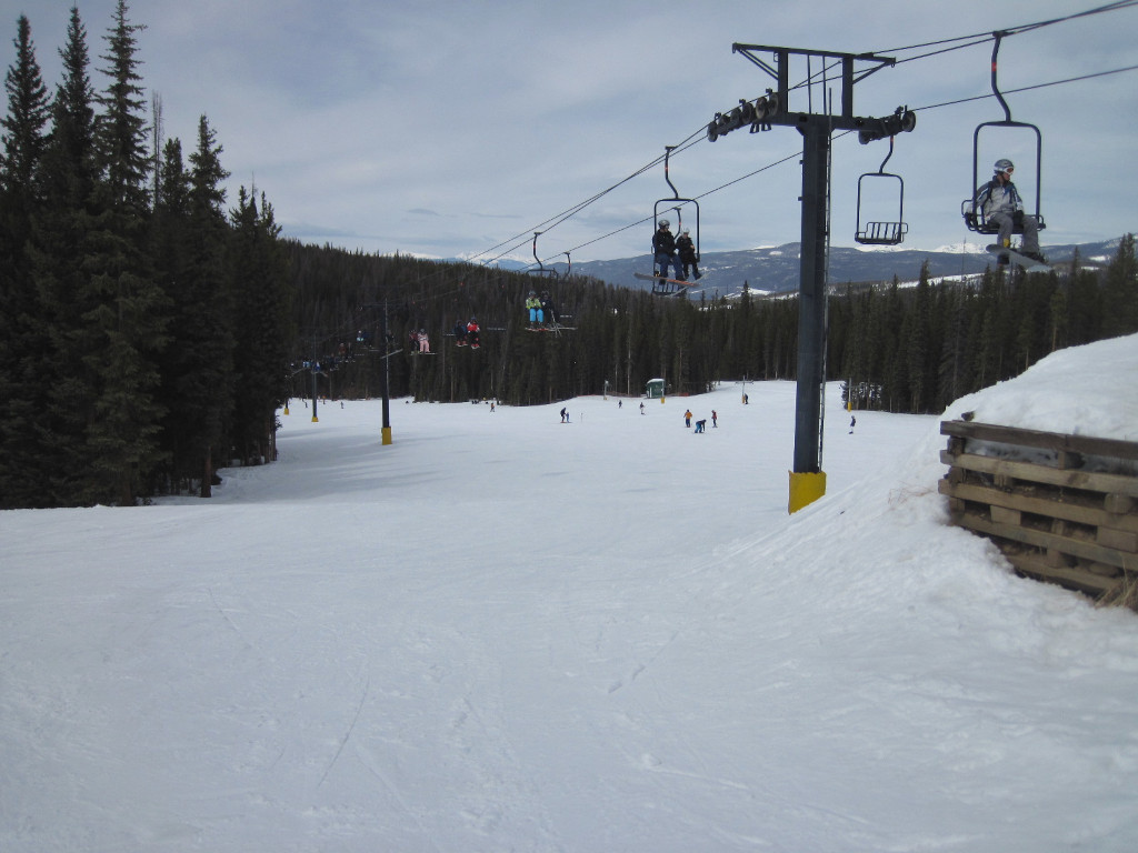 chairlift and beginner ski trail Bill Wilson's way at the Winter Park Discovery Park beginner zone