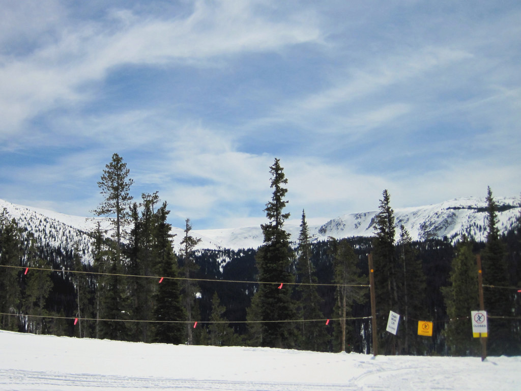 Entrance gate to Winter Park Eagle Wind terrain also showing Vasquez Cirque